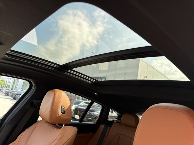 used 2025 BMW X4 car, priced at $52,995