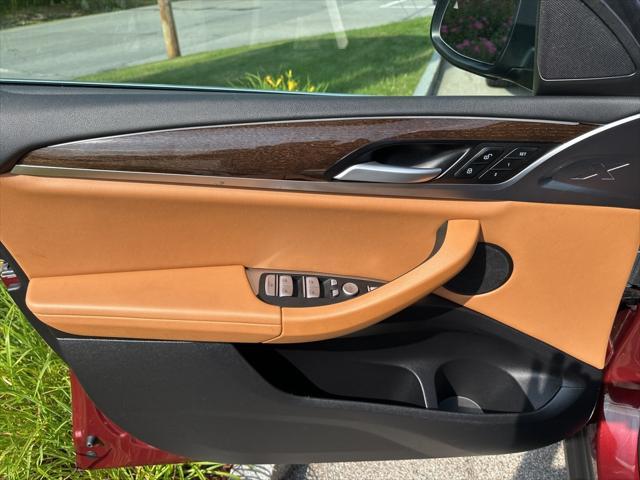 used 2025 BMW X4 car, priced at $52,995