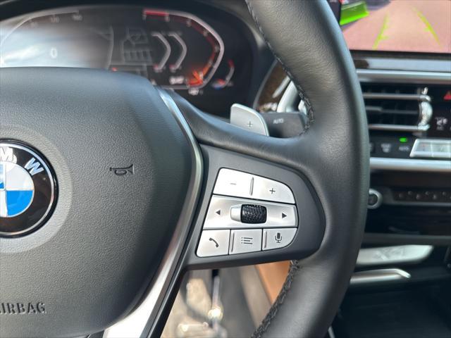 used 2025 BMW X4 car, priced at $52,995
