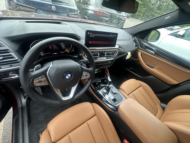 used 2025 BMW X4 car, priced at $54,995