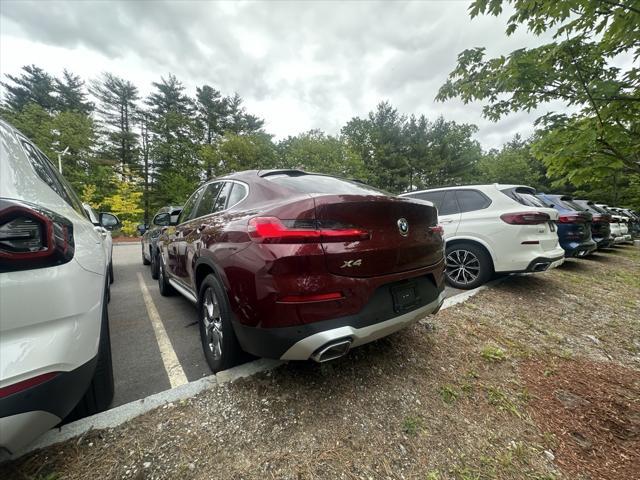 used 2025 BMW X4 car, priced at $54,995