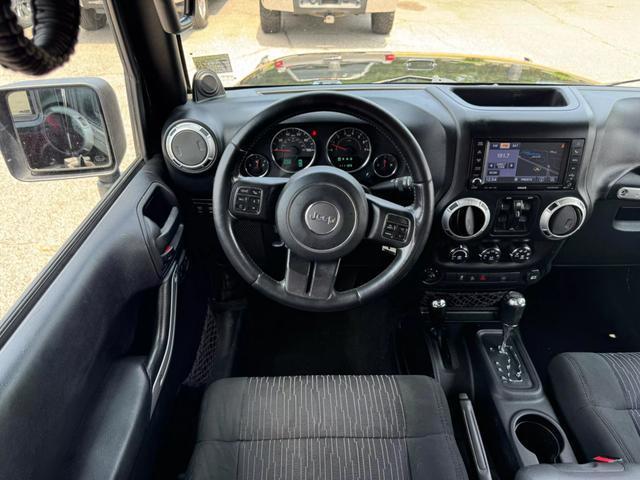 used 2012 Jeep Wrangler Unlimited car, priced at $16,495