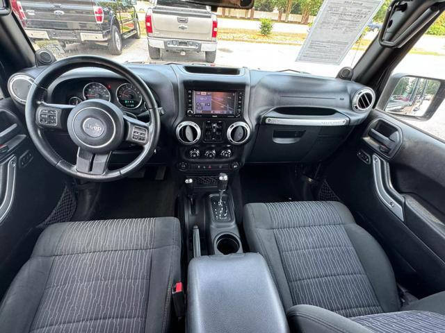 used 2012 Jeep Wrangler Unlimited car, priced at $16,495