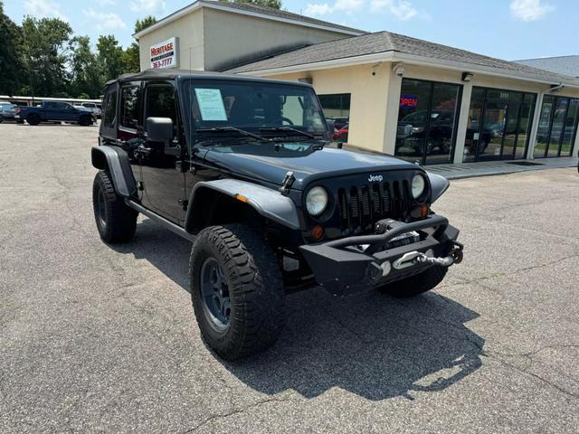 used 2012 Jeep Wrangler Unlimited car, priced at $16,495