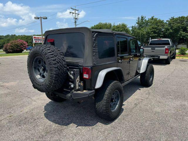 used 2012 Jeep Wrangler Unlimited car, priced at $15,395