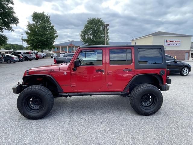 used 2011 Jeep Wrangler Unlimited car, priced at $17,900