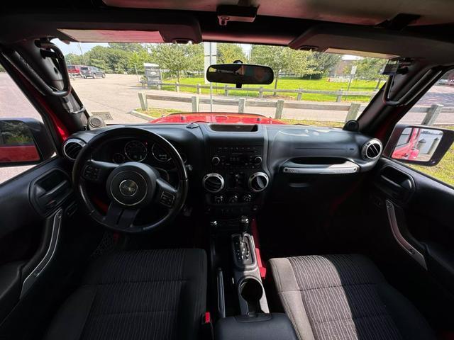 used 2012 Jeep Wrangler Unlimited car, priced at $16,399