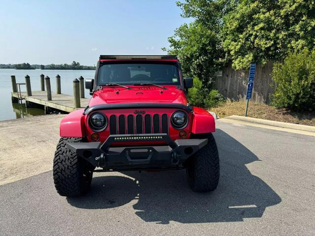 used 2012 Jeep Wrangler Unlimited car, priced at $16,399