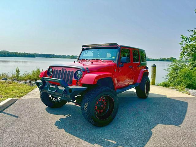 used 2012 Jeep Wrangler Unlimited car, priced at $16,399