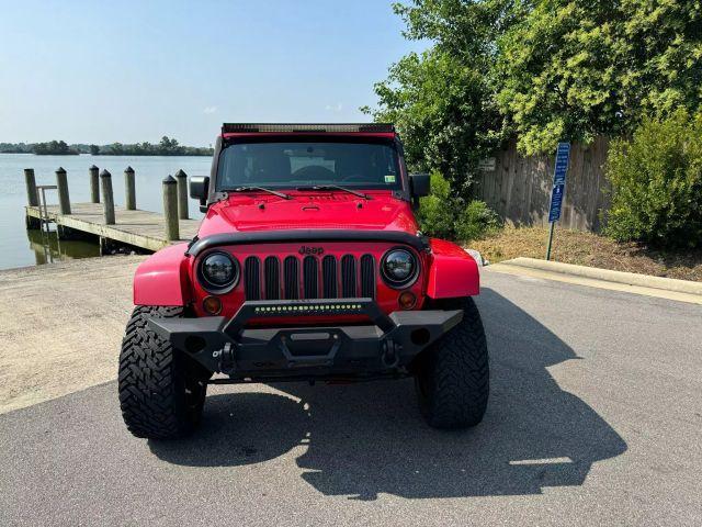 used 2012 Jeep Wrangler Unlimited car, priced at $15,495