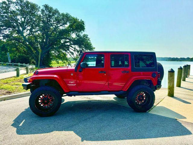 used 2012 Jeep Wrangler Unlimited car, priced at $15,495