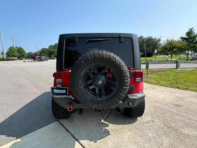 used 2012 Jeep Wrangler Unlimited car, priced at $16,399