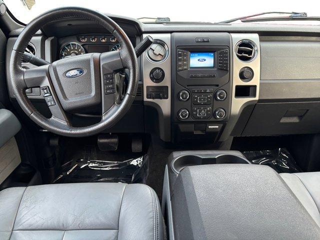 used 2014 Ford F-150 car, priced at $21,877