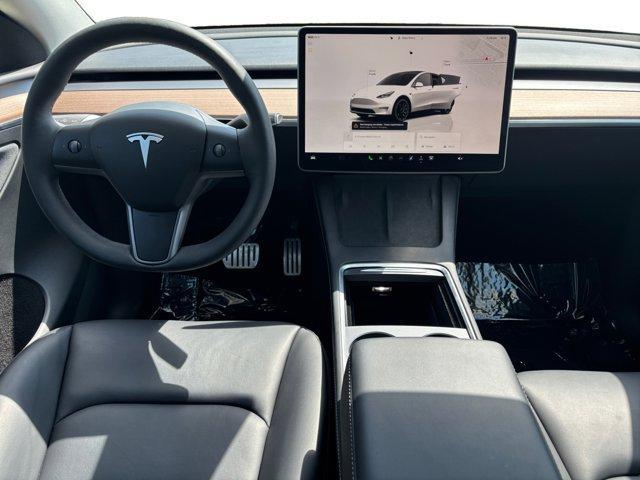 used 2024 Tesla Model Y car, priced at $37,985