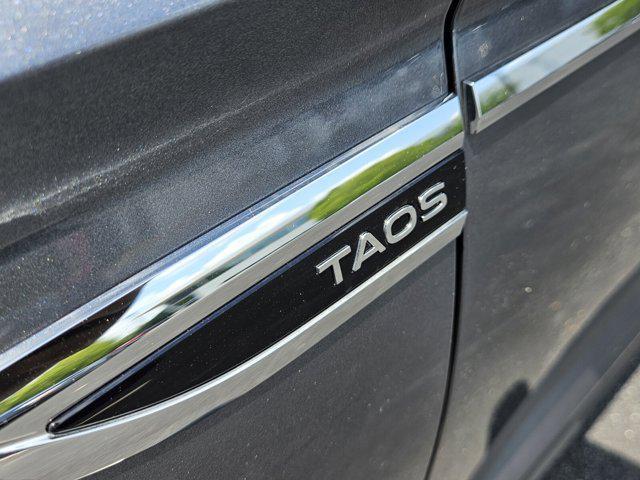 used 2022 Volkswagen Taos car, priced at $21,674