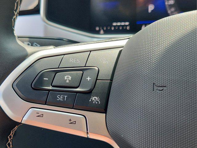 used 2025 Volkswagen Taos car, priced at $27,500