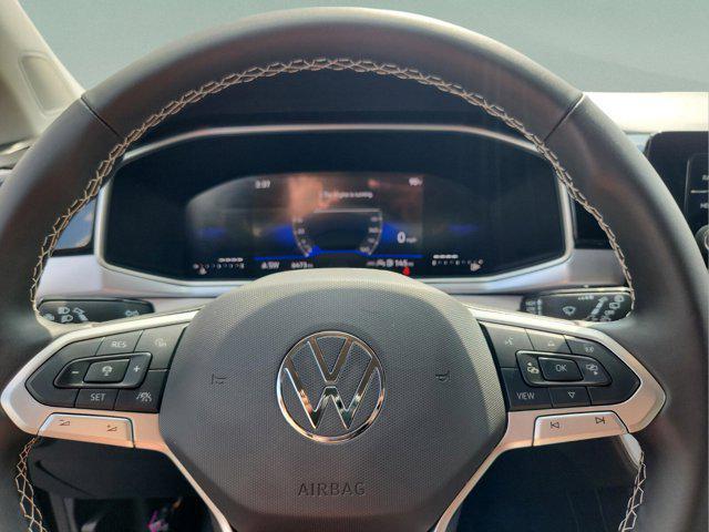 used 2025 Volkswagen Taos car, priced at $27,500