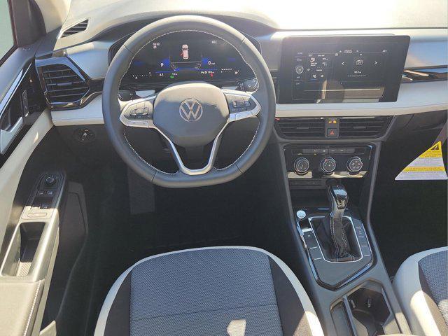new 2025 Volkswagen Taos car, priced at $26,673
