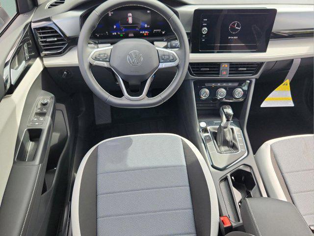 new 2025 Volkswagen Taos car, priced at $26,673