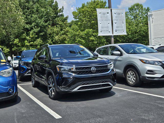 used 2025 Volkswagen Taos car, priced at $25,703