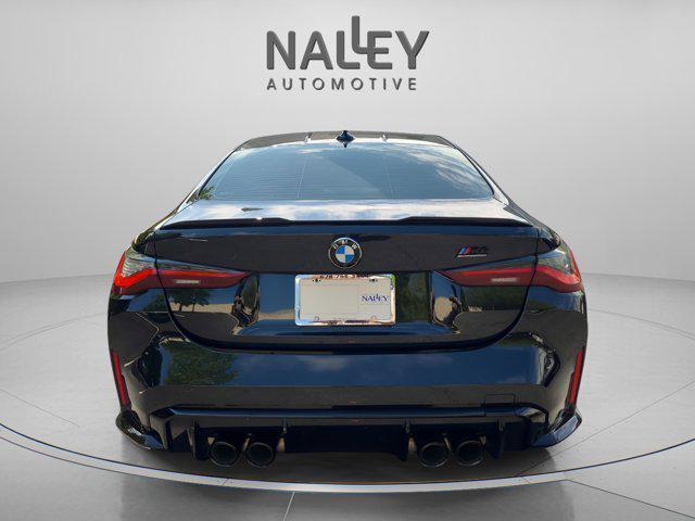 used 2023 BMW M4 car, priced at $73,910