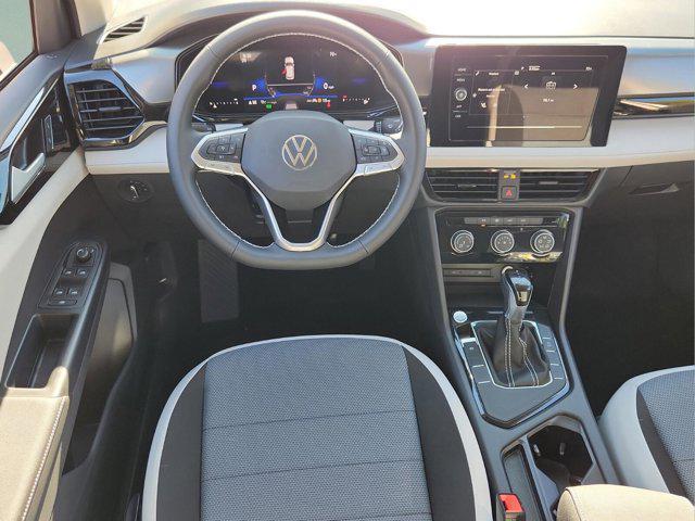 new 2025 Volkswagen Taos car, priced at $26,673