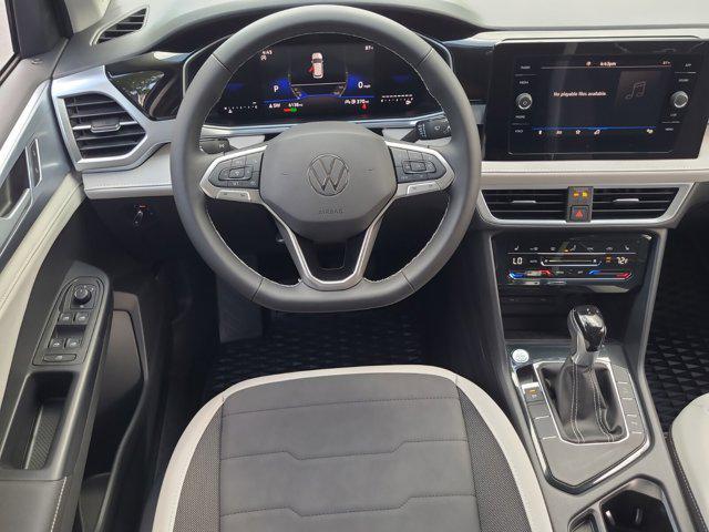used 2025 Volkswagen Taos car, priced at $28,524