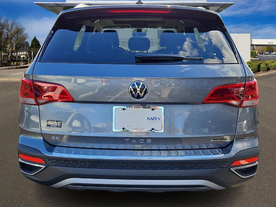 new 2024 Volkswagen Taos car, priced at $32,009