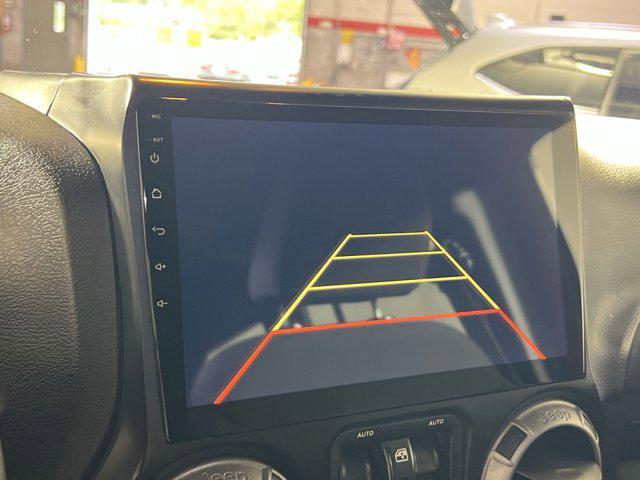 used 2014 Jeep Wrangler Unlimited car, priced at $17,500