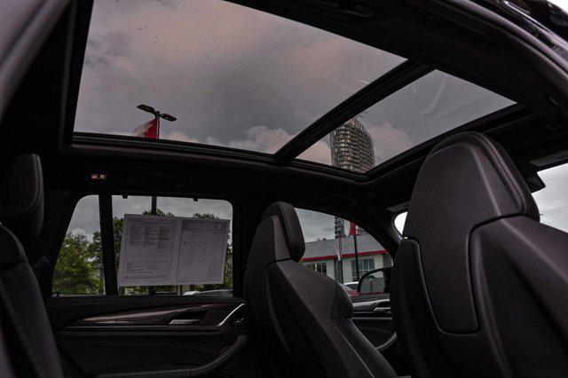 used 2022 BMW X3 M car, priced at $59,000
