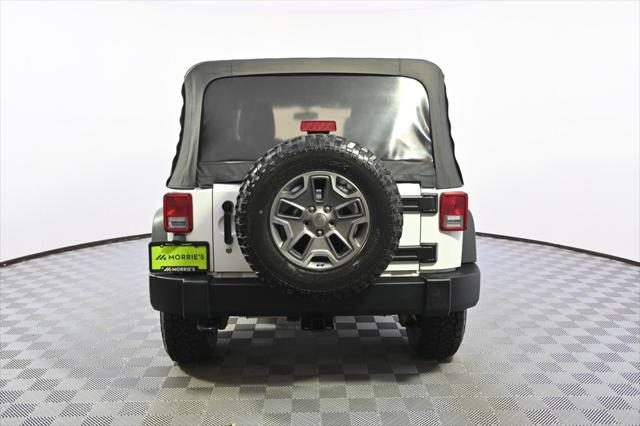 used 2014 Jeep Wrangler Unlimited car, priced at $18,988