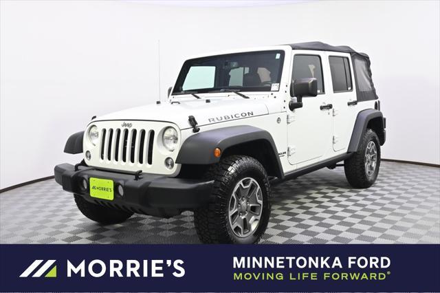 used 2014 Jeep Wrangler Unlimited car, priced at $18,988