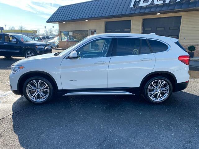 used 2018 BMW X1 car, priced at $17,490