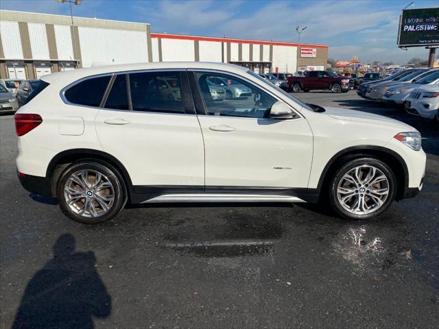 used 2018 BMW X1 car, priced at $17,490
