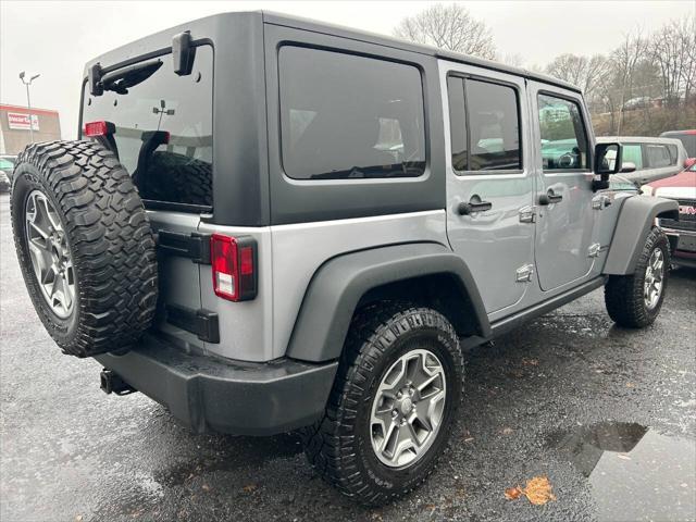 used 2013 Jeep Wrangler Unlimited car, priced at $16,990