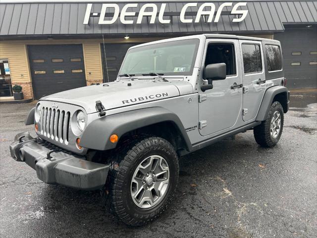 used 2013 Jeep Wrangler Unlimited car, priced at $16,990