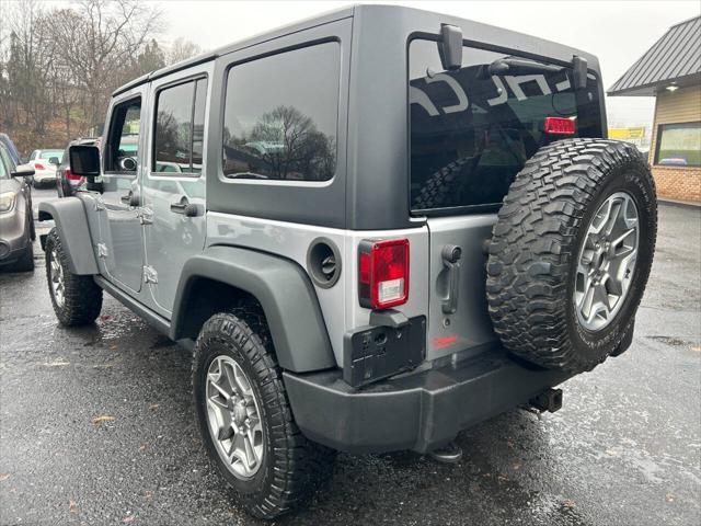 used 2013 Jeep Wrangler Unlimited car, priced at $16,990