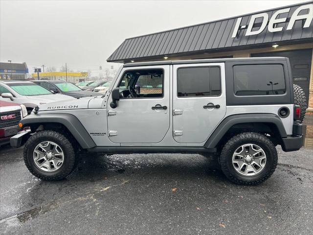 used 2013 Jeep Wrangler Unlimited car, priced at $16,990