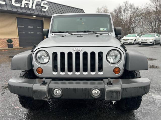 used 2013 Jeep Wrangler Unlimited car, priced at $16,990