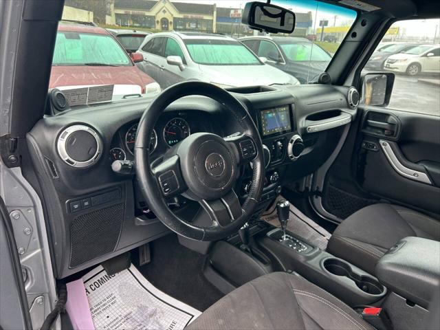 used 2013 Jeep Wrangler Unlimited car, priced at $16,990