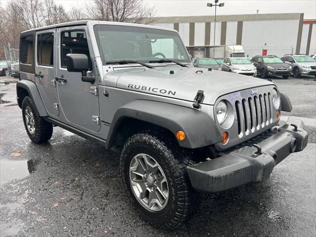 used 2013 Jeep Wrangler Unlimited car, priced at $16,990