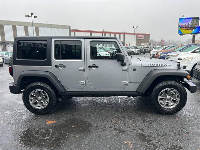 used 2013 Jeep Wrangler Unlimited car, priced at $16,990