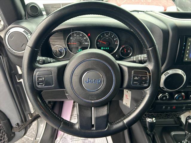 used 2013 Jeep Wrangler Unlimited car, priced at $16,990