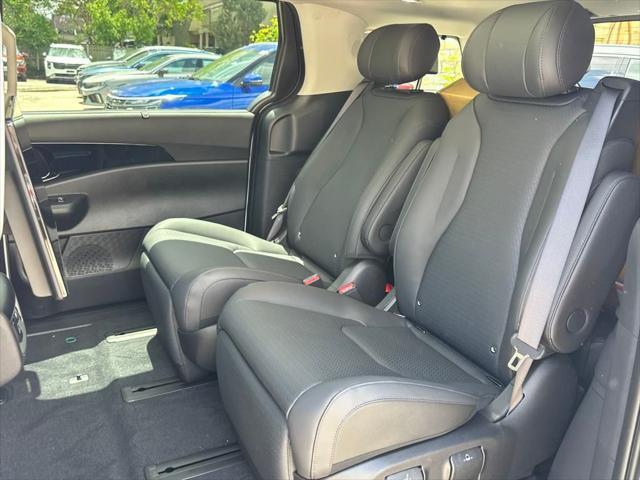 new 2025 Kia Carnival Hybrid car, priced at $55,873