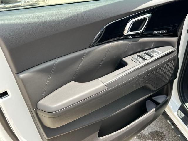 new 2025 Kia Carnival Hybrid car, priced at $55,873
