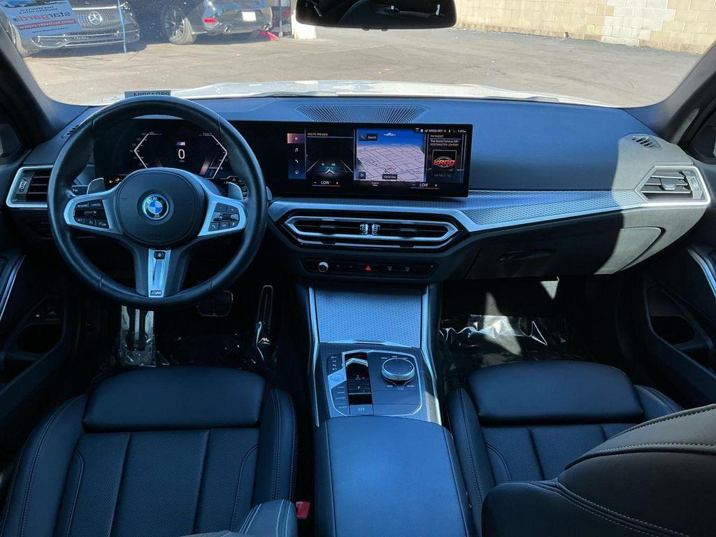 used 2023 BMW 330e car, priced at $27,599