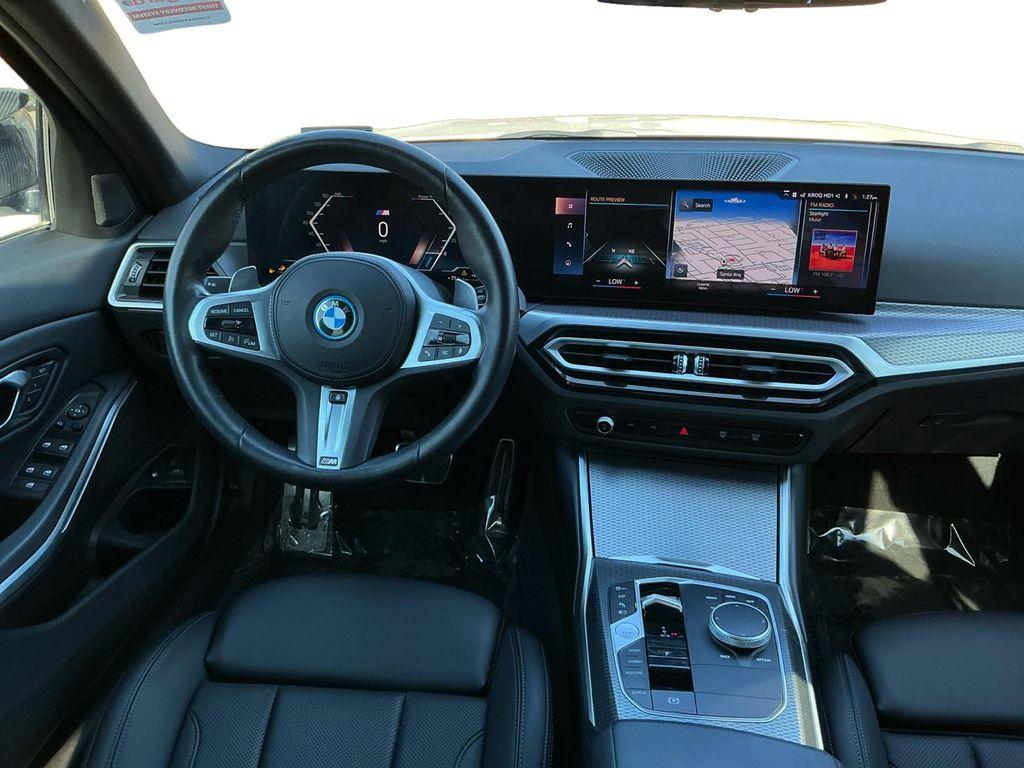 used 2023 BMW 330e car, priced at $27,599