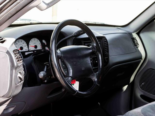 used 2003 Ford F-150 car, priced at $31,999