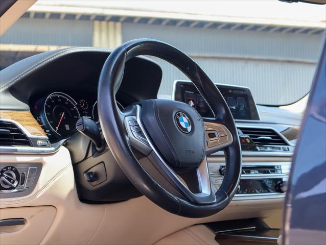 used 2017 BMW 740e car, priced at $26,124