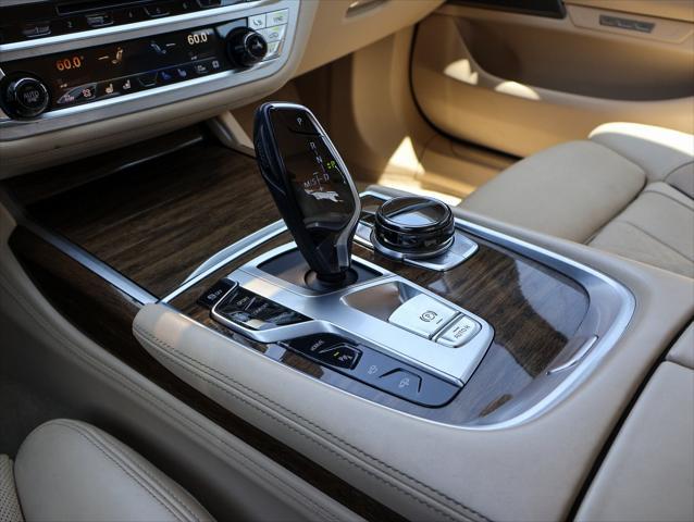 used 2017 BMW 740e car, priced at $26,124